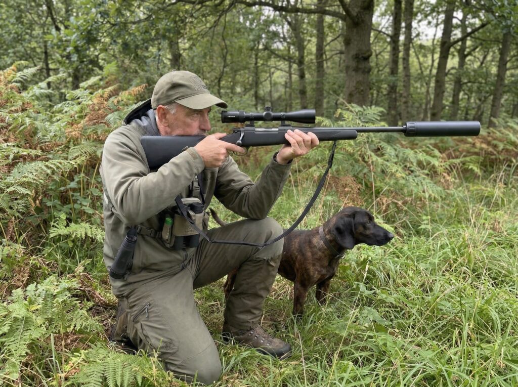 David Safler & Tiggy stalking in a Sussex woodland